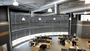 Black transparent vision roller shades for institution