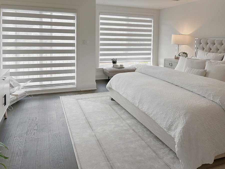 Zebra shades in a modern bedroom offering light control and privacy with a sleek design.