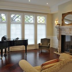 White sunscreen roller shades for living room